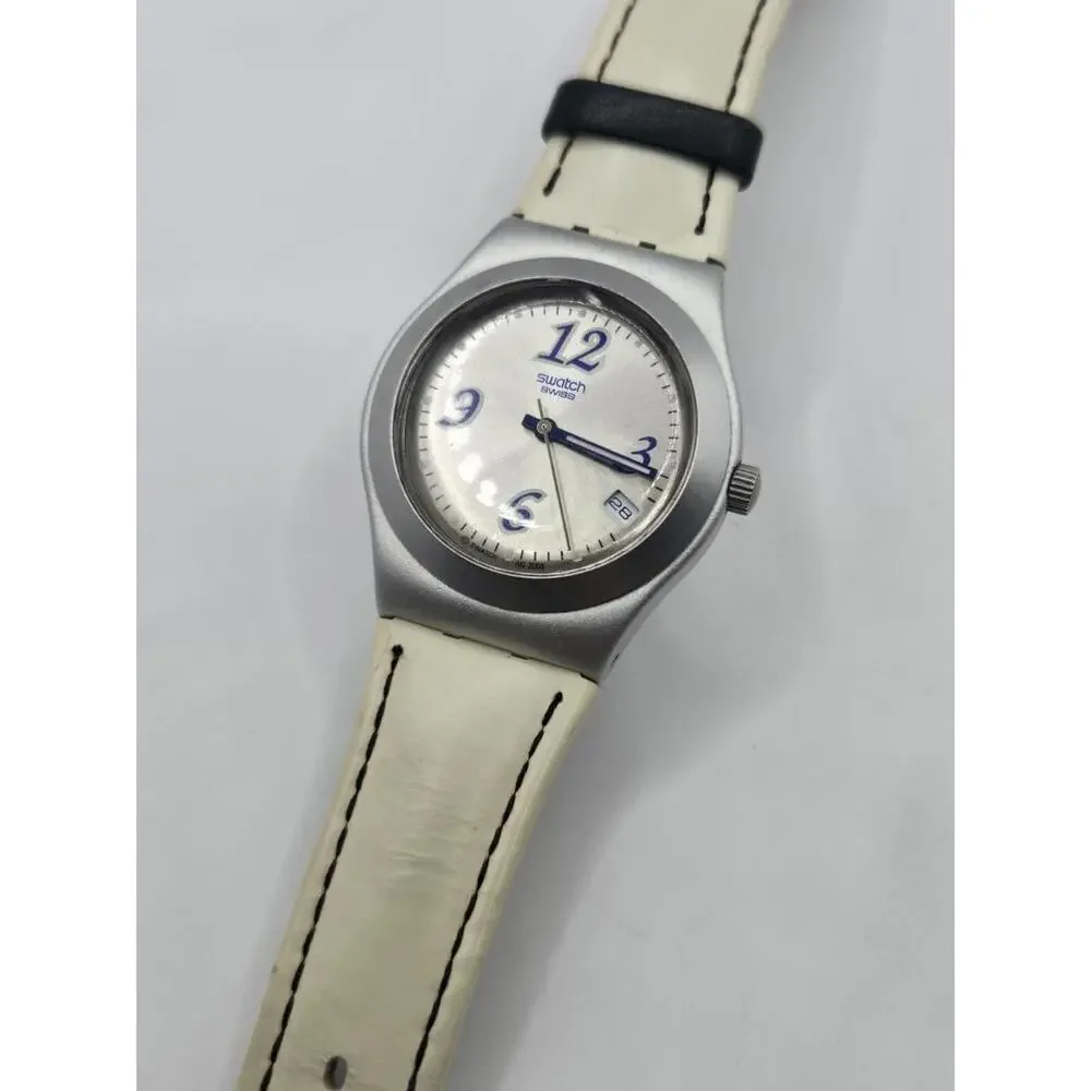 Swatch Women's Silver Case White Strap Watch with Blue Accents